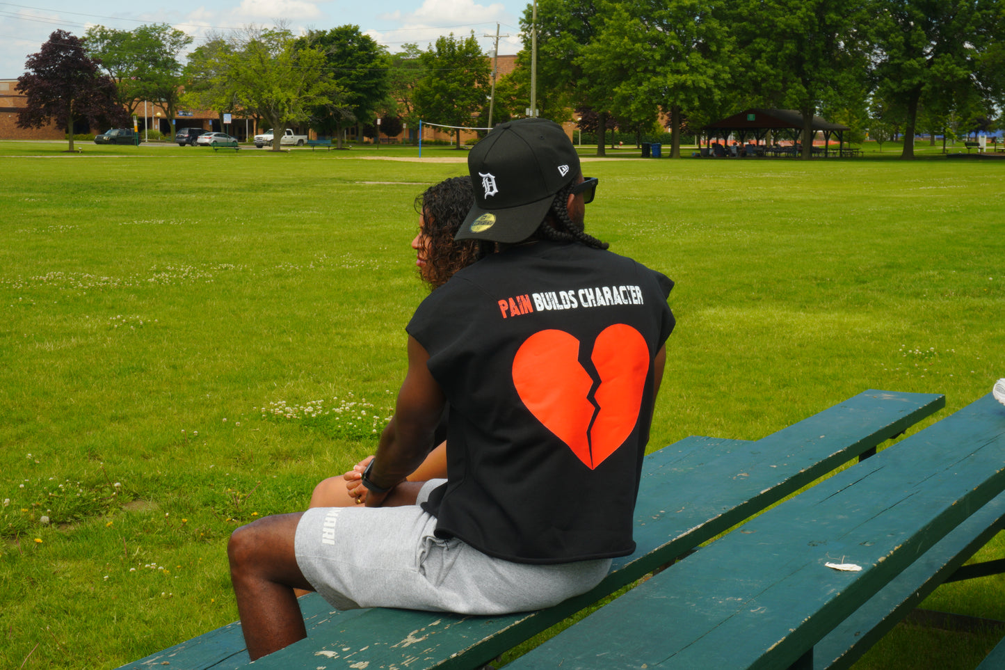 Raw edge “PAIN BUILDS CHARACTER” sleeveless shirt